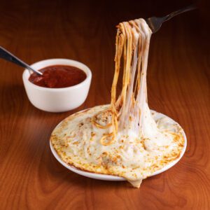 plated spaghetti parm on table