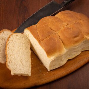 sliced italian bread on cutting board